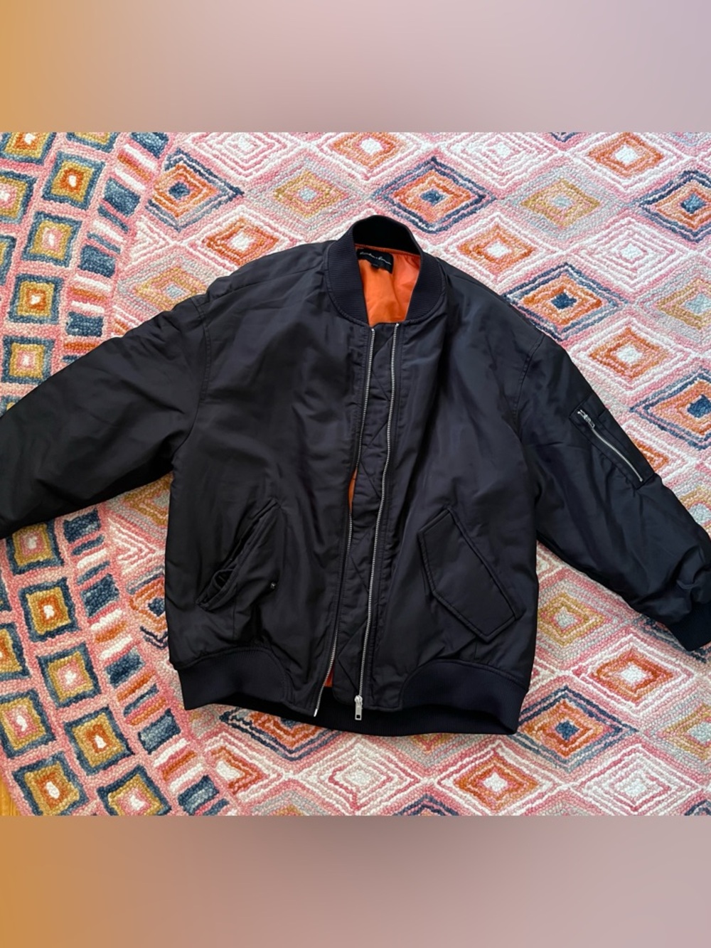Black Bomber Jacket with Orange Lining